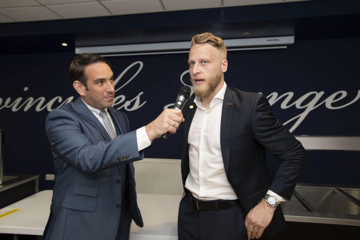 Preston Compere John Norcott interviewing Tom Clarke