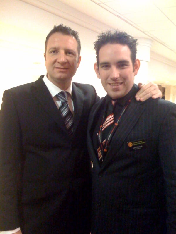 Former Manchester United player Lee Martin with match day MC John Norcott